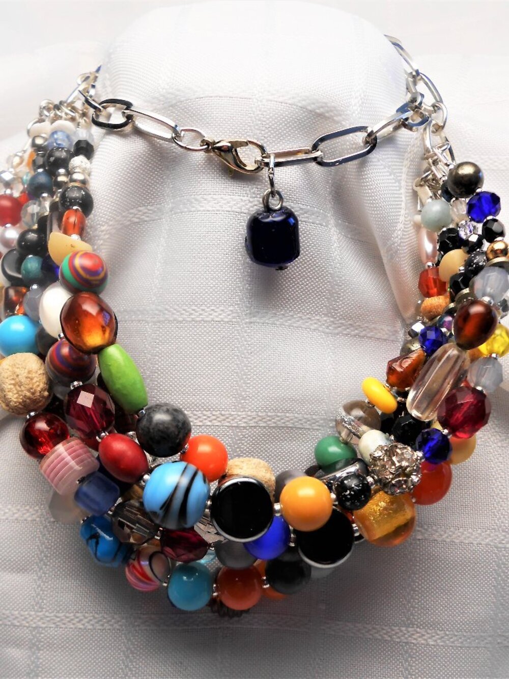 No449 Handmade necklace with rows of polished stones, glass crystals, shells etc
